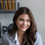 asian lawyer woman working with a laptop computer KQ9PYZQ